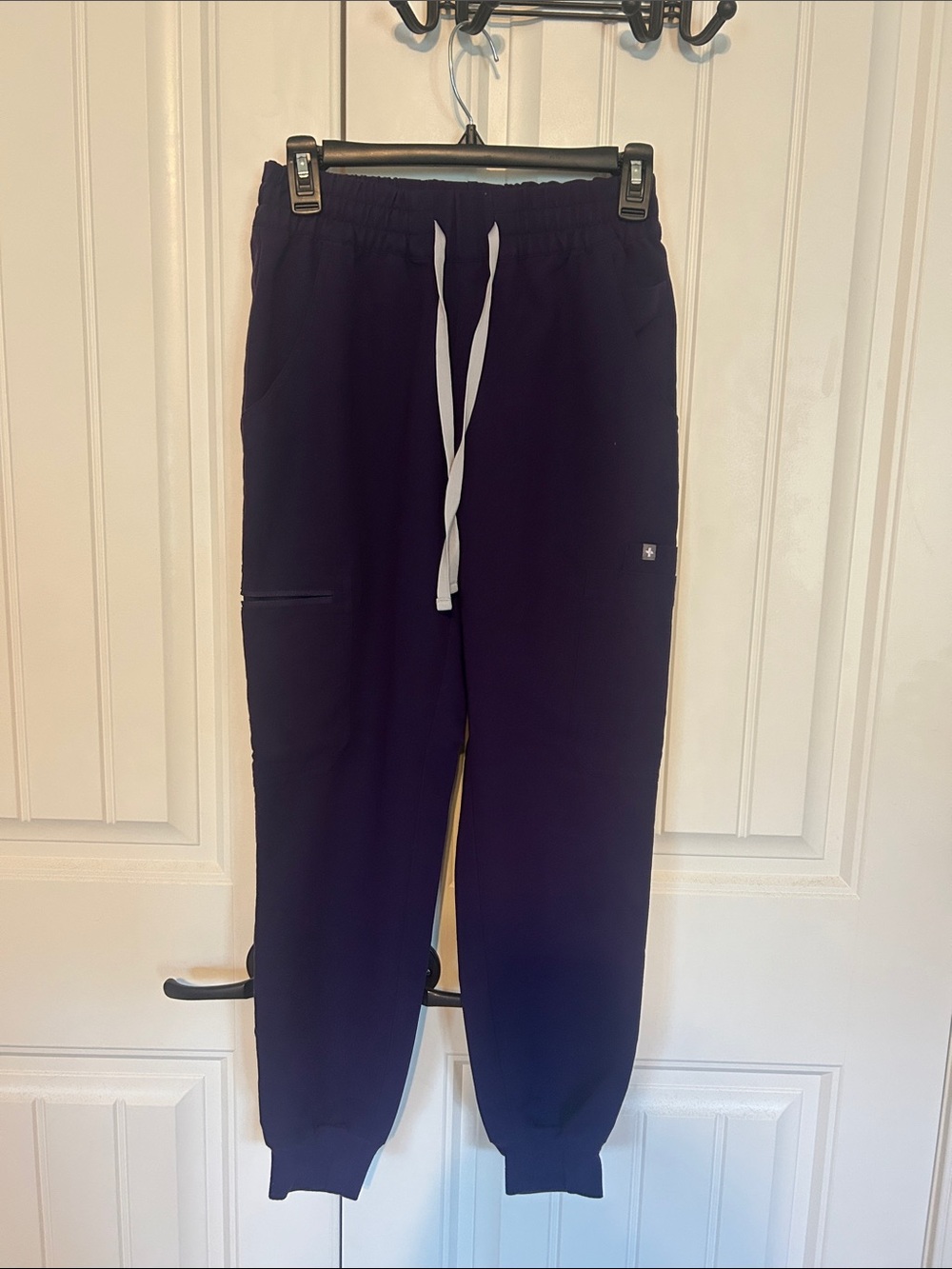 Womenโs Figโs high waisted Uman purple jam Jogger/casma top scrub set.